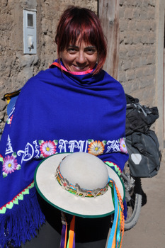 Judit wearing Gabriela's poncho and hat